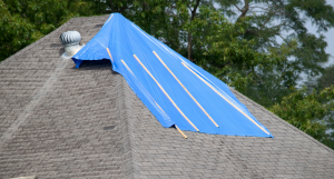 Tarped roof ready for repair